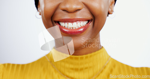 Image of Teeth whitening, smile and black woman with mouth closeup for beauty or dental happiness in studio white background. African, lips and wellness from dentist, healthcare and veneers or orthodontics