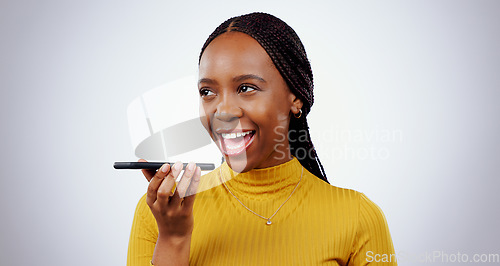 Image of Phone call, loudspeaker or black woman in studio for talking, gossip or chat on grey background. Voice app, thinking or happy person in conversation or speaking of good news, feedback or networking