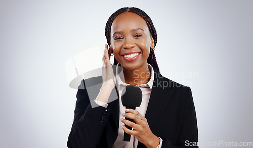 Image of Portrait, smile and broadcast with black woman, microphone or journalist on white studio background. Face, African person or model with interview, reporting or questions with news, listen or feedback