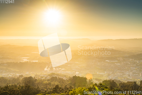 Image of Sunset with sun rays over the Guimaraes