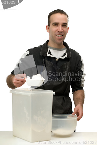 Image of Man Measuring Flour