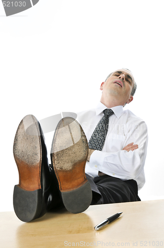 Image of Sleeping businessman