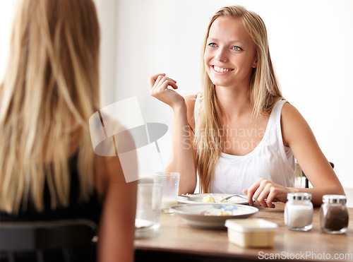 Image of Friends, chat and woman in cafe for brunch, lunch or morning conversation in coffee shop. Happy, face and women at breakfast in restaurant or bistro with happiness listening to gossip or discussion