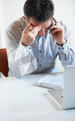 Image of Phone call, stress or businessman with audit in company on mobile conversation as communication. Laptop, crisis or frustrated manager in discussion, talking or speaking of debt or paperwork in office