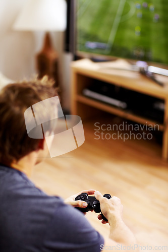 Image of Man, video game and home with tv, controller or back to relax with online competition in living room. Gamer person, playing or contest with click for strategy, streaming or digital challenge in house