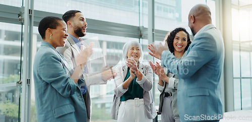 Image of Happy business people, meeting and applause in teamwork for promotion, winning or success at office. Group of employees smile clapping in team achievement, corporate growth or motivation at workplace