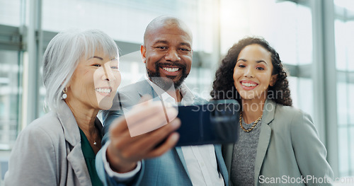 Image of Happy business people, face and selfie at office for photography, team building or social media. Group of corporate employees smile for quick photograph, picture or memory in teamwork at workplace