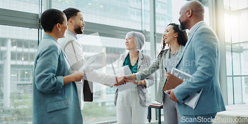 Image of Business people, handshake and meeting in b2b, deal or agreement for teamwork or growth at office. Businessman shaking hands with woman in recruiting for team introduction, greeting or partnership