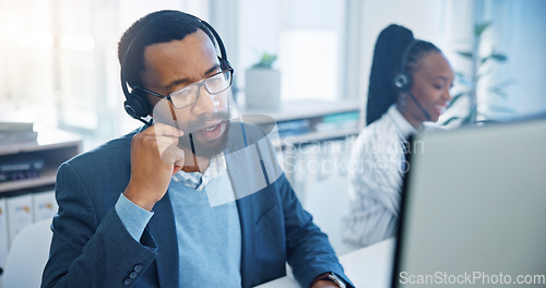 Image of Computer, customer support and a black man consultant working in a call center for service or assistance. Contact, crm and headset communication with an employee consulting in a retail sales office