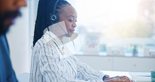 Image of Black woman, call center and drinking coffee in customer service, support or telemarketing at the office. African female person, consultant or agent enjoying hot beverage in contact us at workplace