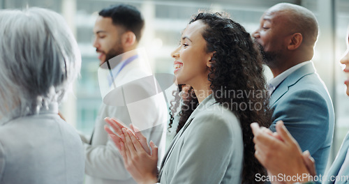 Image of Celebration, business woman and clapping at a conference with teamwork and motivation in office. Discussion, staff and collaboration with professional team at a seminar with workforce and achievement