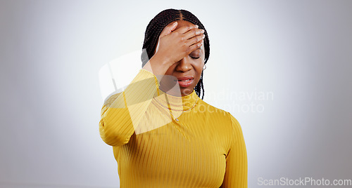 Image of Headache, black woman and pain with stress, anxiety and problem from vertigo in studio. White background, African female person and mental health with fatigue and sick from migraine, fail or grief