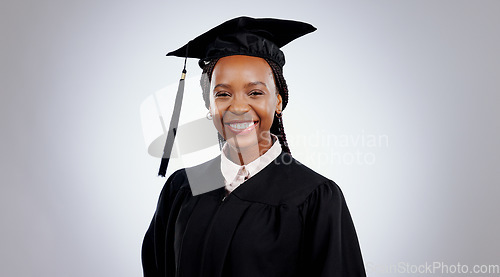 Image of Graduate, black woman and portrait with smile from college and academy achievement in studio. Happy, university student and school success with white background and African female person with study