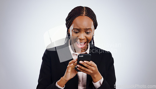 Image of Business woman, reading phone and wow for news, email or notification of investment or bonus on a white background. African person in surprise, excited and shocked on mobile for opportunity in studio