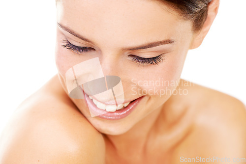 Image of Skincare, woman and happy in studio with beauty, cosmetic and facial wellness for shine on white background. Person, face and smile for glow treatment, healthy aesthetic or dermatology and wellbeing