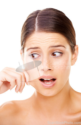 Image of Skincare, woman and pulling cheek in studio for wrinkles, stress or inspection on white background. Aging, anxiety or model face with skin stretch crisis, acne or dermatology, problem and allergy