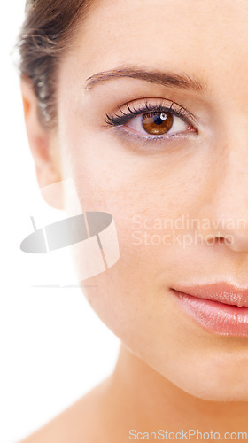 Image of Portrait, closeup and woman with beauty, skincare and dermatology isolated on a white studio background. Half, face and person with healthy skin, treatment and grooming with makeup, soft and wellness