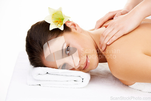 Image of Portrait, hands for massage and woman with a flower on her head at the spa isolated on a white background. Face, beauty and luxury wellness with a young customer at a studio salon for treatment