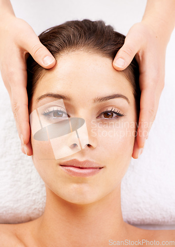 Image of Spa massage, portrait and hands on face of woman from above at a resort for stress relief or wellness. Top view, facial and female with masseuse at a beauty salon for luxury, skincare or dermatology