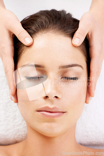 Image of Spa massage, relax and hands on face of woman from above at a resort for stress relief or wellness. Top view, facial and female with masseuse at a beauty salon for luxury, skincare or dermatology