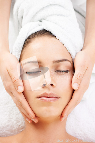 Image of Spa massage, peace and hands on face of woman from above at resort for stress relief or wellness. Top view, facial and female client with masseuse at beauty salon for luxury, skincare or dermatology