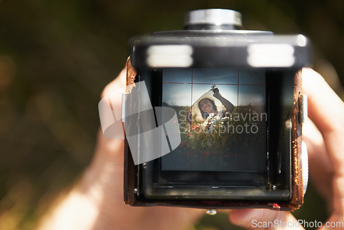 Image of Camera, viewfinder and woman with photography, outdoor and pose with nature, memory and picture. Photo, closeup and person with summer break, photographer and field with digital equipment and frame