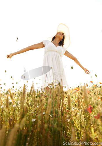 Image of Smile, freedom and woman with open arms at field outdoor in the countryside in summer. Happy person in nature, eyes closed and relax at farm, breathe fresh air and enjoy vacation, travel and peace