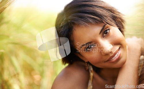 Image of Portrait, smile and woman in field of grass in the countryside, summer outdoor for health or beauty. Face, happy person at farm and nature, garden and travel on holiday, vacation or relax in Brazil