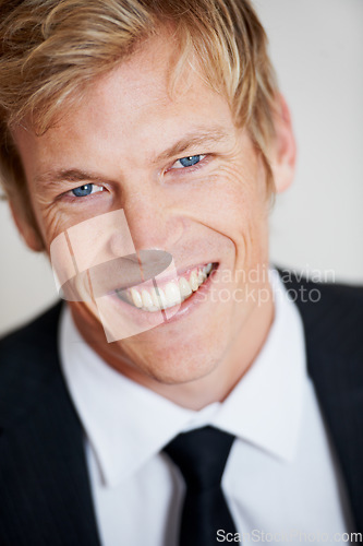 Image of Man, smile and portrait in suit or white background in studio for confident worker, business clothes or formal. Male person, happy and face for cool corporate fashion, style trend or blazer pride