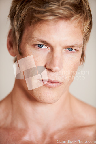 Image of Man, portrait and shirtless confident or studio white background, strength or pride. Male person, model and face serious for topless strong neck or shoulders bare or attractive, cool muscle in Norway