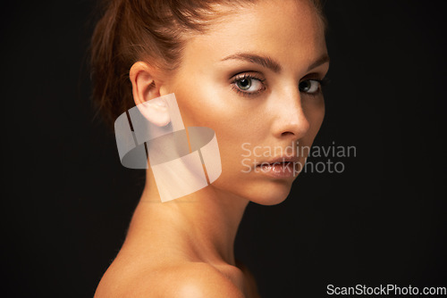 Image of Skincare, portrait or model with beauty, makeup or results for glow, shine or space in studio. Black background, girl or serious woman with cosmetics for mockup, wellness or foundation on smooth face