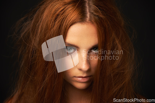 Image of Depression, portrait or woman in studio with messy hair, trauma stress or bad results alone. Black background, psychology or face of a lonely female person with anger, burnout or moody attitude