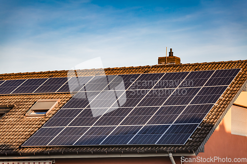 Image of Photovoltaic panels on the roof of family house, solar panels. 