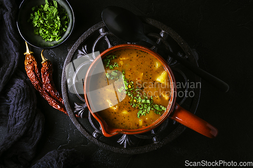 Image of Hungarian hot goulash soup, beef, tomato, pepper, chili, smoked paprika soup. Traditional Hungarian dish.