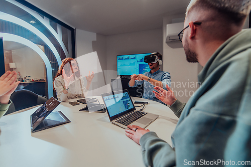 Image of A diverse group of businessmen collaborates and tests a new virtual reality technology, wearing virtual glasses, showcasing innovation and creativity in their futuristic workspace