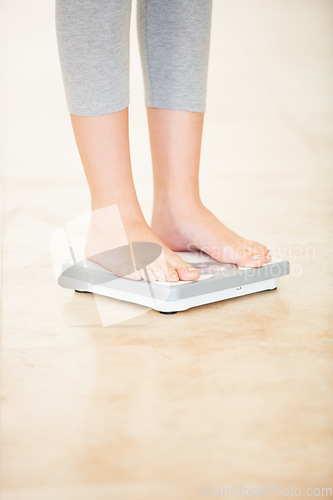 Image of Woman, weight loss and feet on scale for measurement, goal and control diet for health and wellness. Fitness, scales and person measuring, check and weighing body, mass and electronic device or tech