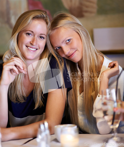 Image of Portrait, women or friends in a cafe, smile or relax with happiness, bonding together or funny. Face, people or girls with conversation, cheerful or restaurant with gossip, sharing secret or speaking