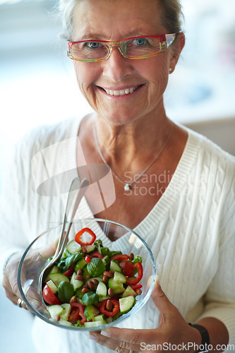 Image of Portrait, smile and senior woman with salad for healthy diet, nutrition and wellness in glasses. Face, happy person and bowl of vegetables, organic vegan food and benefits, detox and lunch in home