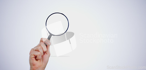 Image of Magnifying glass searching for deals, hand and investigation, search or study with mockup space on white background. Knowledge, source and spy person with analysis, research and reading with problem