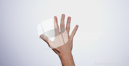 Image of Hand, counting five and person in studio with mockup space for advertising, promotion or marketing. Fingers stop, hold up closeup and man model with mathematics numbers gesture for empty mock up by w