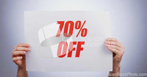 Image of Discount sign, hands with offer and opportunity for shopping, poster and advertising on white background. Store sale, communication and promotion, person with billboard for 70 off deal for service in