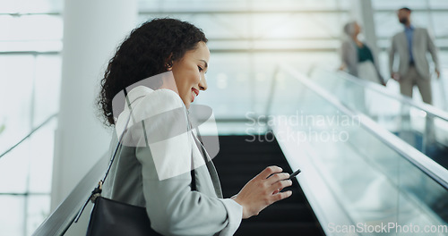 Image of Business woman, phone text and airport with travel, smile and commute for work. Mobile, transport and online with a female person with journey and worker vacation with bag and happy on escalator