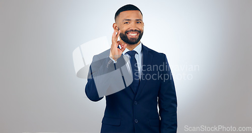 Image of Portrait, yes and corporate businessman in studio with smile, ok gesture for deal announcement and mockup space. Thank you, agreement and happy man with gratitude, opinion or vote on white background