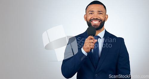 Image of Portrait, microphone and corporate businessman in studio with smile, pride and professional news anchor. Happy man, reporter or broadcast journalist with mic on white background with mock up space.