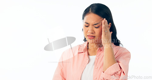 Image of Stress, headache and asian woman in studio with anxiety for tax, audit or review on white background. Vertigo, migraine and Japanese model with brain fog, burnout or dizzy, overthinking or disaster