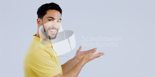 Image of Portrait, man or advertising presentation in studio of information, deal or news about us on white background. Happy indian model show mockup space for feedback, sales promotion or launch coming soon