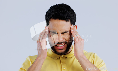 Image of Headache, sick and man in studio with stress, vertigo and mental health on white background. Face of frustrated indian model with pain, anxiety and tired of migraine, burnout and fatigue of brain fog