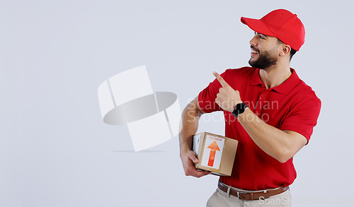 Image of Man, courier and pointing with delivery in studio with mock up for offer on white background in Mexico. Male model, hand and gesture for announcement, promotion or notification in space for logistics