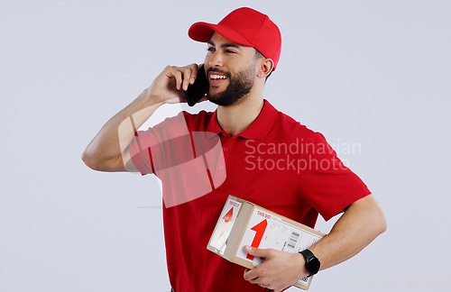 Image of Man, delivery and phone for communication in studio for courier mock up on white background in Mexico. Male model, package or box with smile for conversation for logistics, parcel or order in space