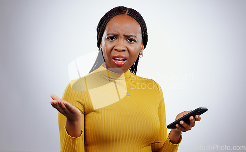 Image of Phone text, black woman and confused portrait from scam conversation and anxiety from problem and fail. Studio, white background and frustrated female person with spam communication and mistake